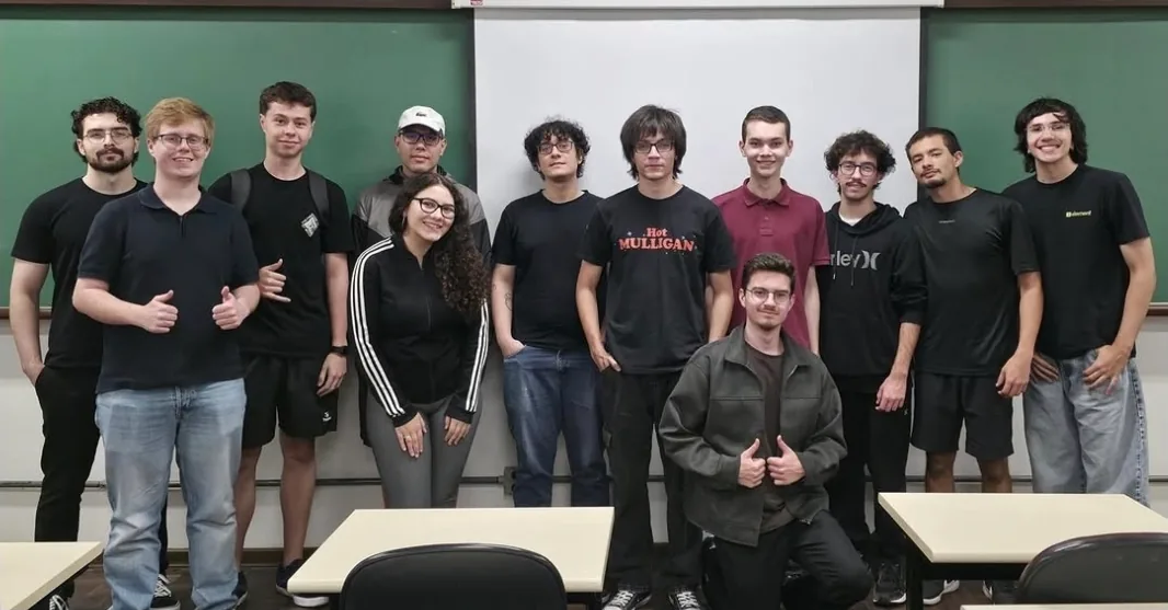 The Builders Club gathered for a group photo in a PUCPR classroom after a weekly session.